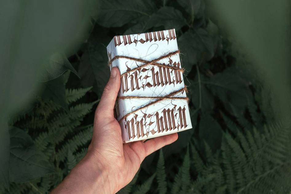 Organic herbal wraps with eucalyptus and linen on marble